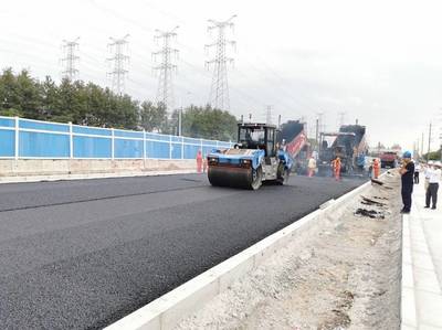 昆陽路越江大橋主線通車 公路與路面工程成果豐碩，年底有望實現行人過橋